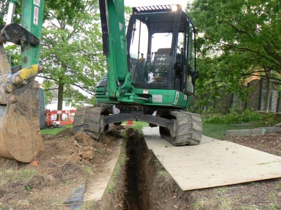 Root barrier installation to retain aged Oak in subsidence case.