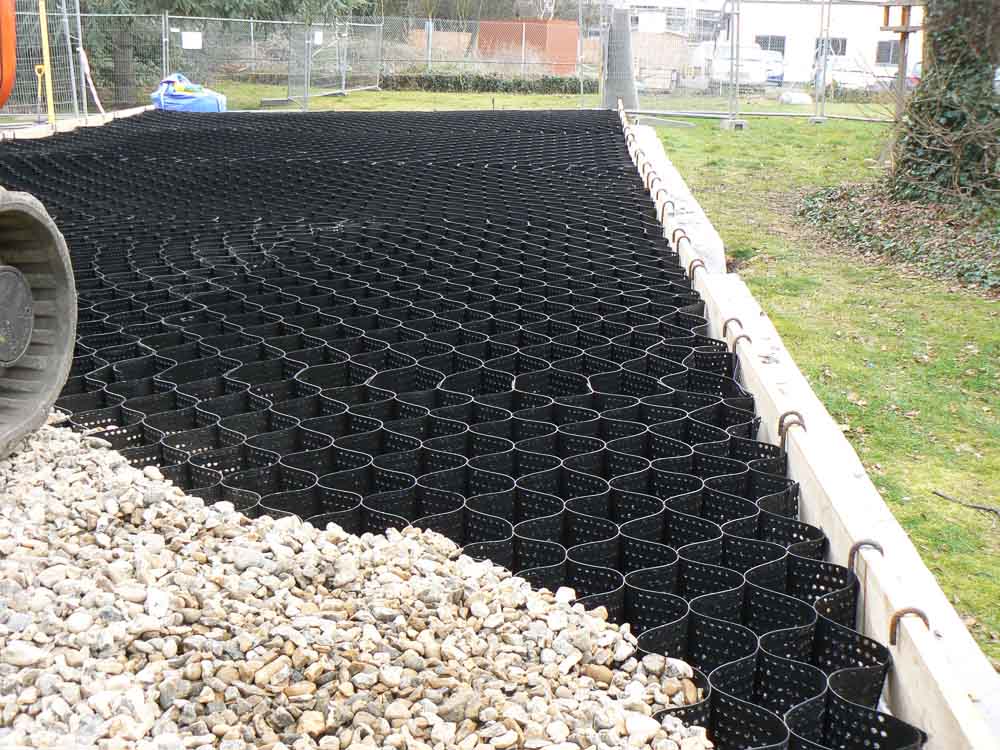 Backfilling the cellweb with clean crushed stone